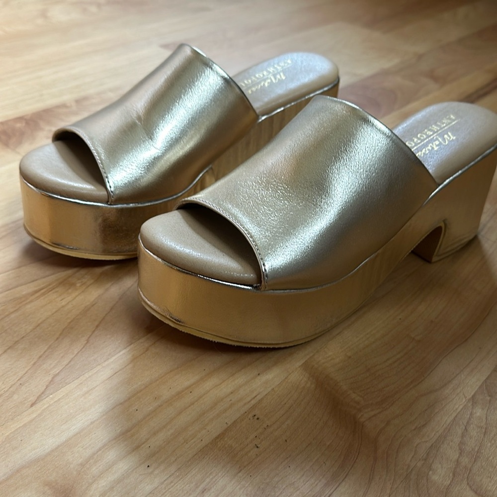 Gold platform sandals currently at Anthropologie